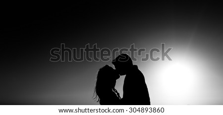 Romantic couple in love. silhouette of a loving couple