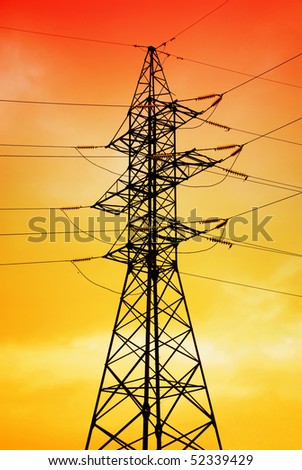power line silhouette on red sky background