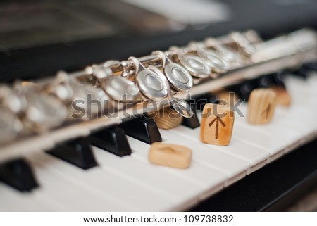 flute and the runes on the keyboard
