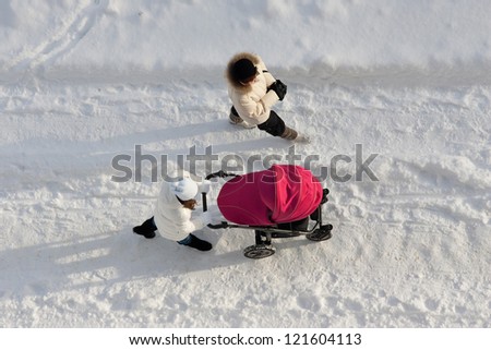 People walking in winter on snow