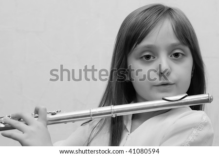 Girl Playing Silver Flute