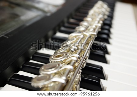 Flute on a Piano