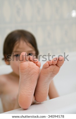 bare toes in a tub