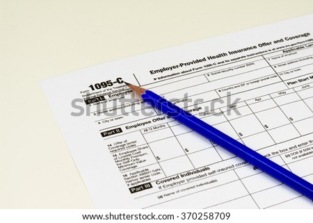 IRS Form 1095-C, Tax Form Details for Tax Season with Light Background