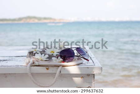 Net flower bag on the table near the sea