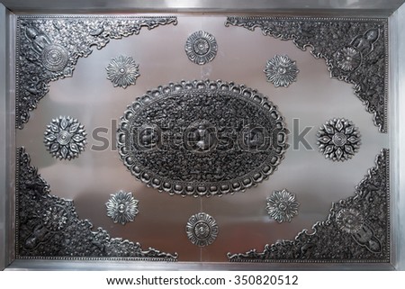Metal foil handicraft with folk art in temple of Thailand (Wat muensarn; They are public domain or treasure of Buddhism, no restrict in copy or use)