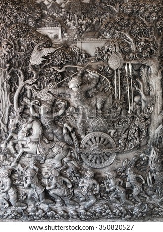 Metal foil handicraft with folk art in temple of Thailand (Wat muensarn; They are public domain or treasure of Buddhism, no restrict in copy or use)