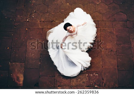 dynamic bride in a magnificent dress top down