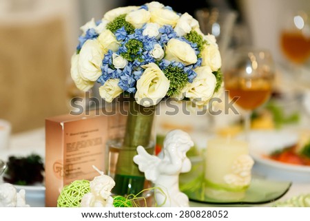expencive fancy bouquet with beautiful blue and pastel roses