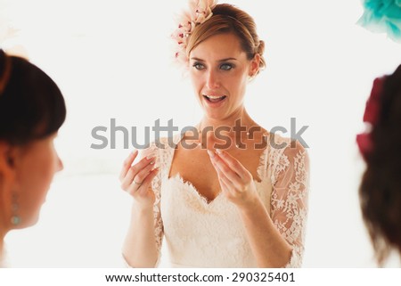 beautiful  gorgeous blonde bride  crying, hawai  colorful sand ceremony  on cyprus