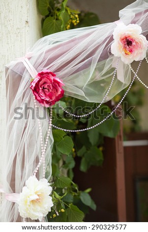 traditionally decorated with branches flowers ribbons lace front door young bride