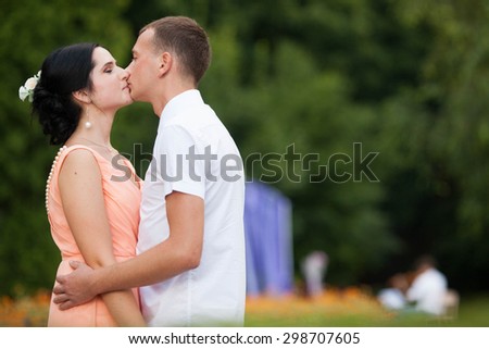 full of love stylish beautiful young caucasian couple on background of green park, summer, Lviv