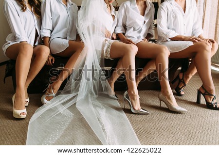 Lovely legs of the bride and her friends