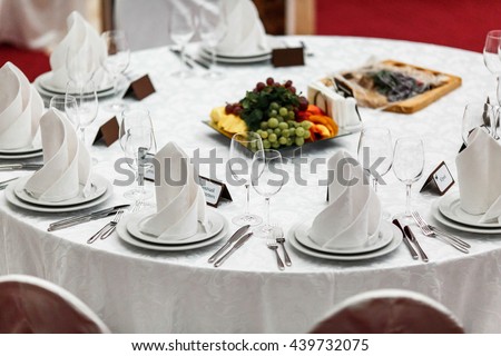 Round restaurant table served luxury for a festive dinner