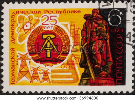 MOSCOW - 1974: Postal stamp USSR. Vintage stamp devoted  25 years of German Democratic Republic, circa 1974.