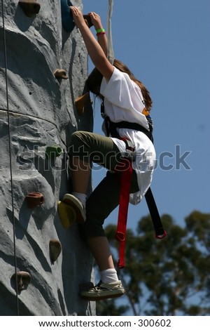Climbing the Rock wall at the fair