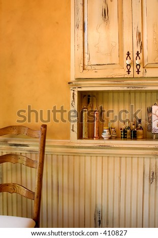 Kitchen Nook after remodel using distressed woods and Italian Plaster
