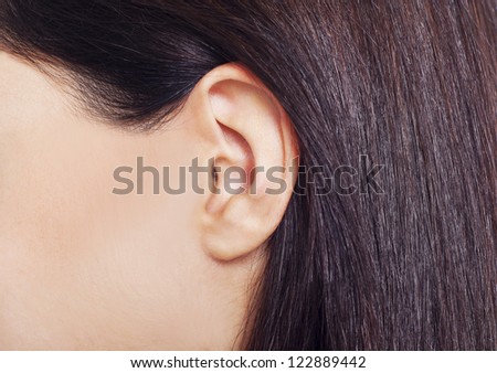 Woman ear closeup