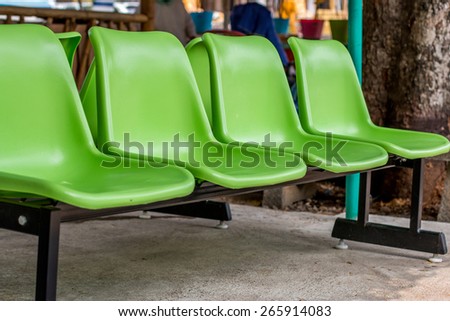 Green chairs on the floor , pattern green chairs in the temple