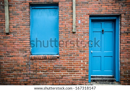 Blue door and windows, brick building, Treme, New Orleans, USA