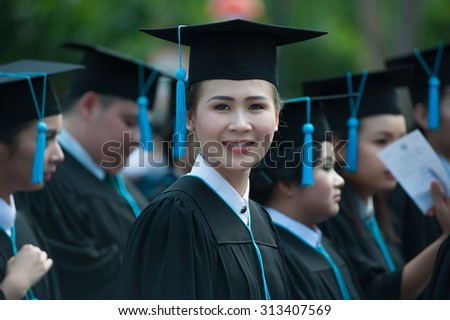 Young woman is graduated bachelor degree from a university famous in thailand