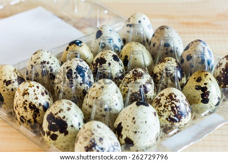 Quail eggs in a plastic tray