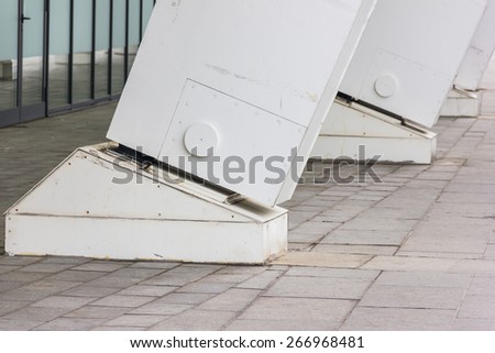 Large white metal columns closeup outdoor