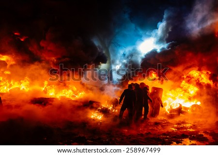 Protesters walk on fire