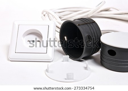 Electric wall socket, socket box, power cable on white background