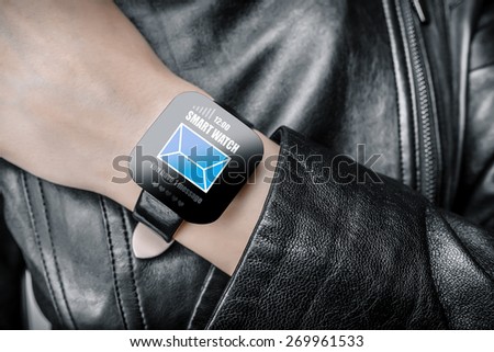 Smart watch. Female body with black smart watch on hand.