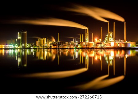 Industry reflection in water at night