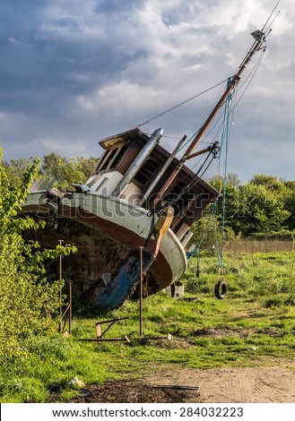 Wrecked boat on land