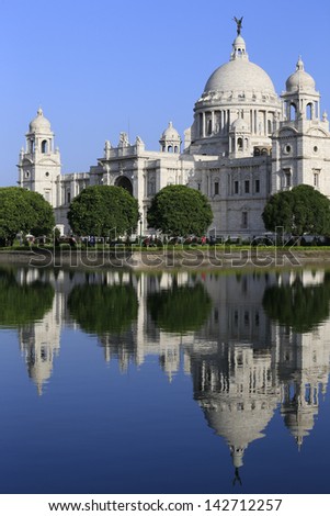 Victoria Memorial with reflection, one of the famous Historical Monument of Indian Architecture. It was built between 1906 and 1921 to commemorate Queen Victoria\'s 25 years reign in India, Kolkata.