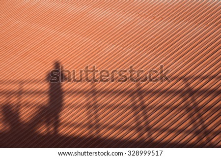 roof and human shadow