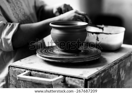 Pottery Craft Ceramic Clay In Potter Human Hand. Toned Instant Photo