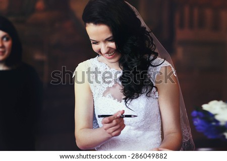 wedding ceremony of  beautiful young gorgeous stylish brunette bride in city hall of tivoli italy