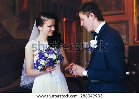 wedding ceremony of  beautiful young gorgeous stylish brunette bride and groom tivoli italy