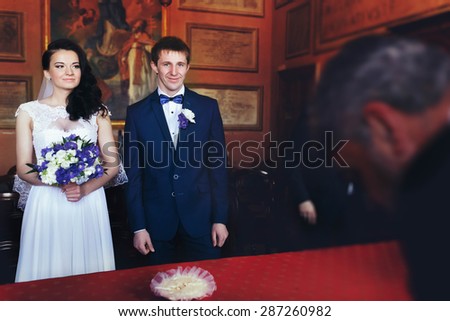 wedding ceremony of  beautiful young gorgeous stylish brunette bride and groom tivoli italy