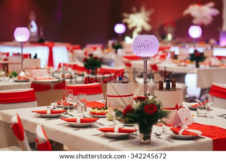 Luxury expensive catering and wedding reception decorations tables with roses