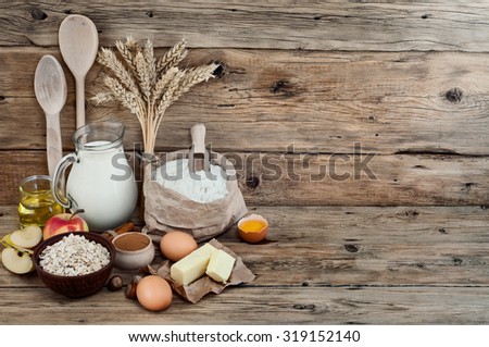 baking ingredients or cooking apple pie eggs, flour, wheat, sunflower oil, butter, cinnamon, milk, apples, yeast. food background. Free space for text. Copy space. Top view