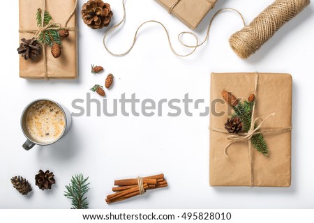 Square with decorations and gift handmade on white background, top view, flat lay