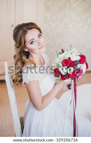 Happy bride having her wedding preparations