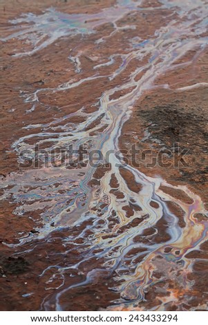 Oil Slick on a beach close up
