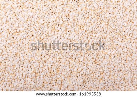 Popped amaranth expanded grains backgrounds, healthy seeds in studio shot, horizontal orientation, nobody.