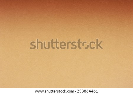 Yellow orange gradient leather cloth texture abstract, bright porous material surface background in horizontal orientation, nobody.