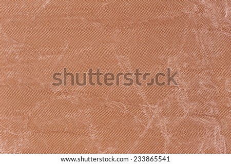 Beige canvas cloth texture abstract, rough plain seamless surface background in horizontal orientation, nobody.