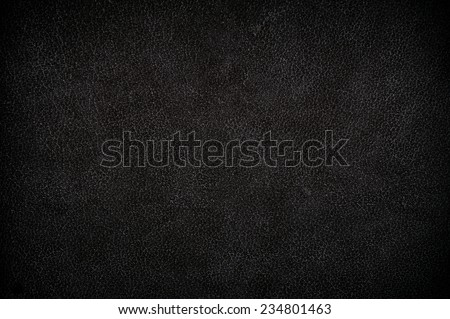 Dark black leather sheet texture abstract, grey gloomy tinted leather imitation, crumpled material surface background in horizontal orientation, nobody.