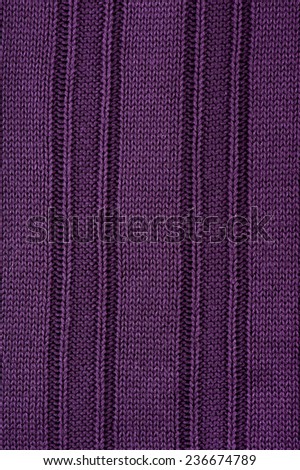 Purple striped sweater cloth texture abstract, dark rough plain seamless surface background in vertical orientation, nobody.