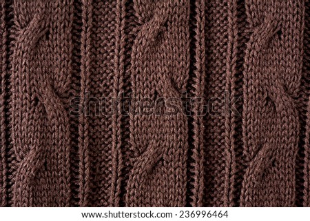 Brown braid jersey cloth texture abstract, dark rough plain seamless surface background in horizontal orientation, nobody.