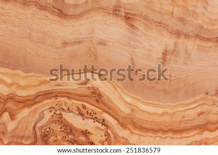 Olive wood plank texture abstract, bright brown cutting board surface in horizontal orientation, nobody.